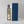 白いギフトボックスに入ったブルドリュッシュ ラベンダーハチミツ 750mlボトルと紺色のギフトボックスの蓋にグレーの背景の画像